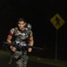 Competitors conduct Fuerzas Comando 24 Night Ruck March