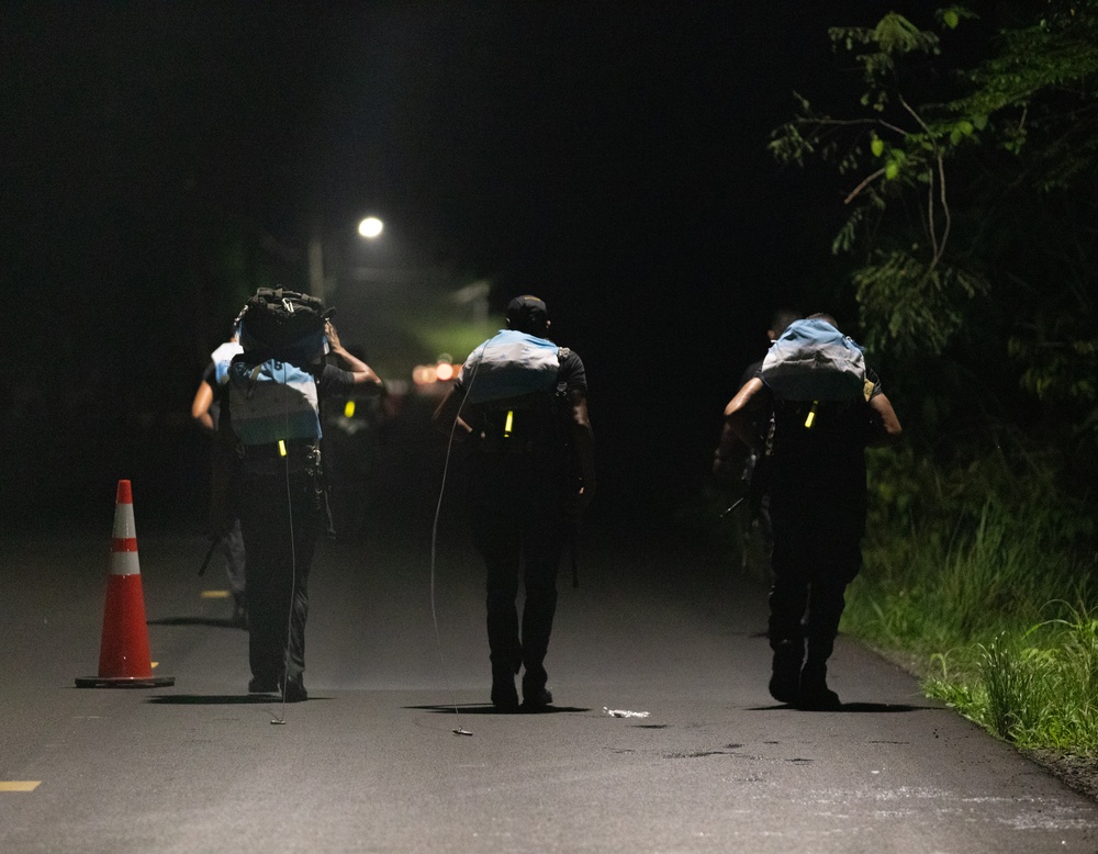 Competitors conduct Fuerzas Comando 24 Night Ruck March