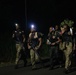 Competitors conduct Fuerzas Comando 24 Night Ruck March