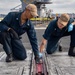 Sailors perform maintenance aboard USS Carl Vinson (CVN 70)