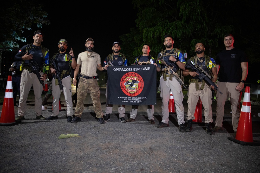 Competitors conduct Fuerzas Comando 24 Night Ruck March