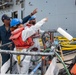 Sailors, assigned to the amphibious assault ship, USS America (LHA 6), conduct preservation work