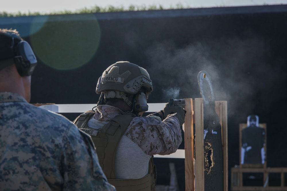 Marines Enhance Pistol Marksmanship Skills in Simulated CBRN Environment