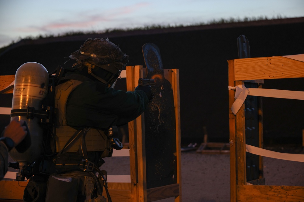 Marines Enhance Pistol Marksmanship Skills in Simulated CBRN Environment