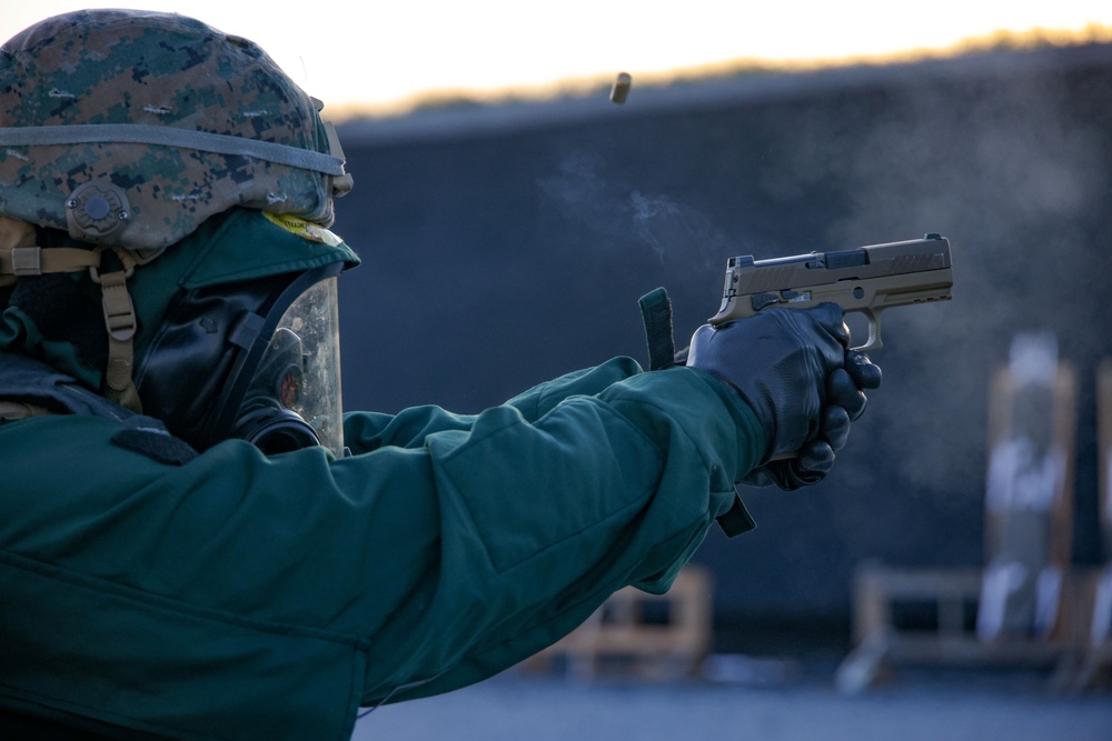 Marines Enhance Pistol Marksmanship Skills in Simulated CBRN Environment