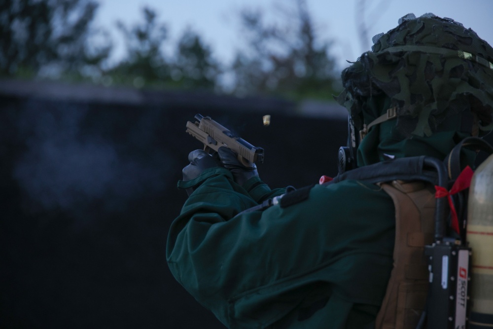 Marines Enhance Pistol Marksmanship Skills in Simulated CBRN Environment