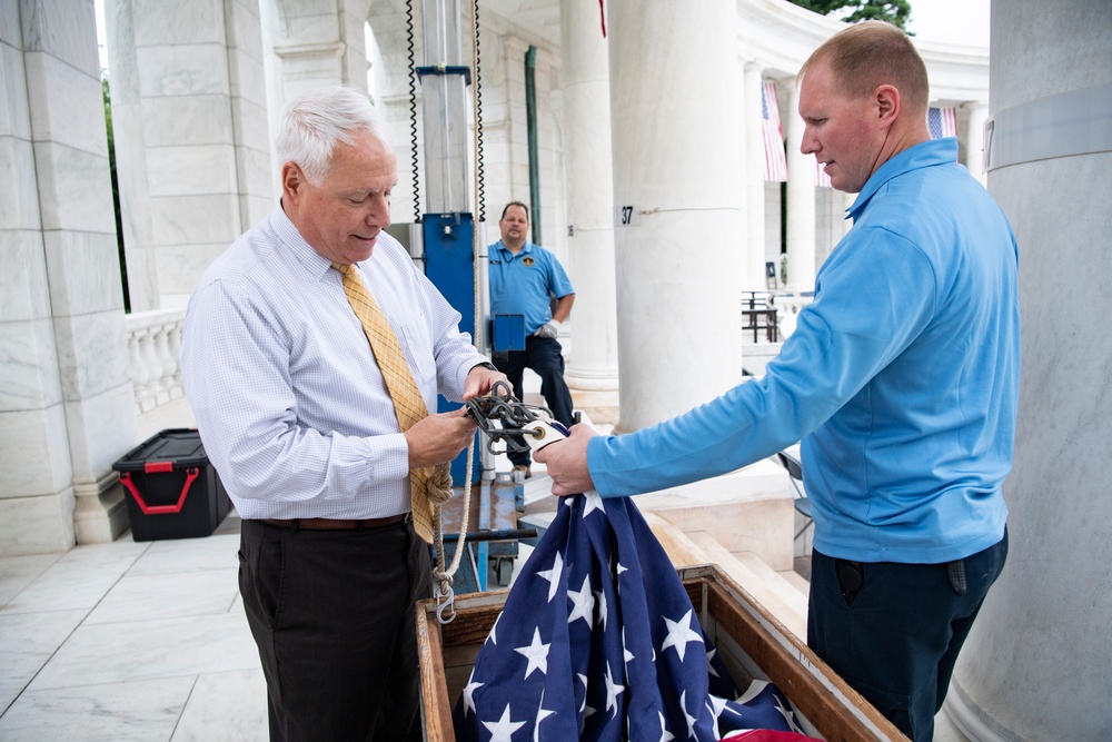 U.S. Flags are Hung in the Memorial Amphitheater in Preparation for the National Memorial Day Observance