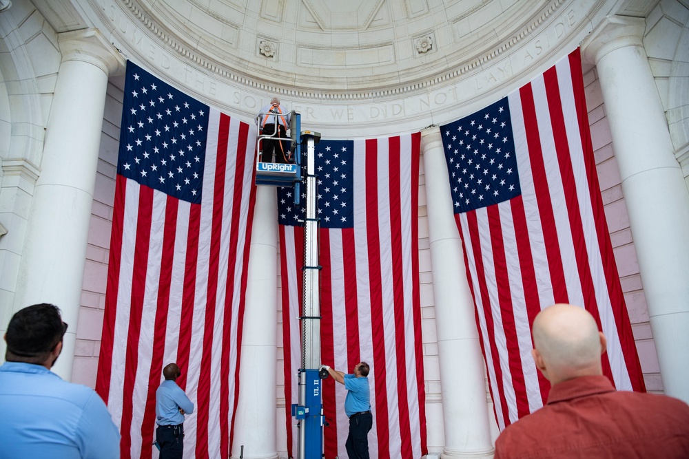 U.S. Flags are Hung in the Memorial Amphitheater in Preparation for the National Memorial Day Observance