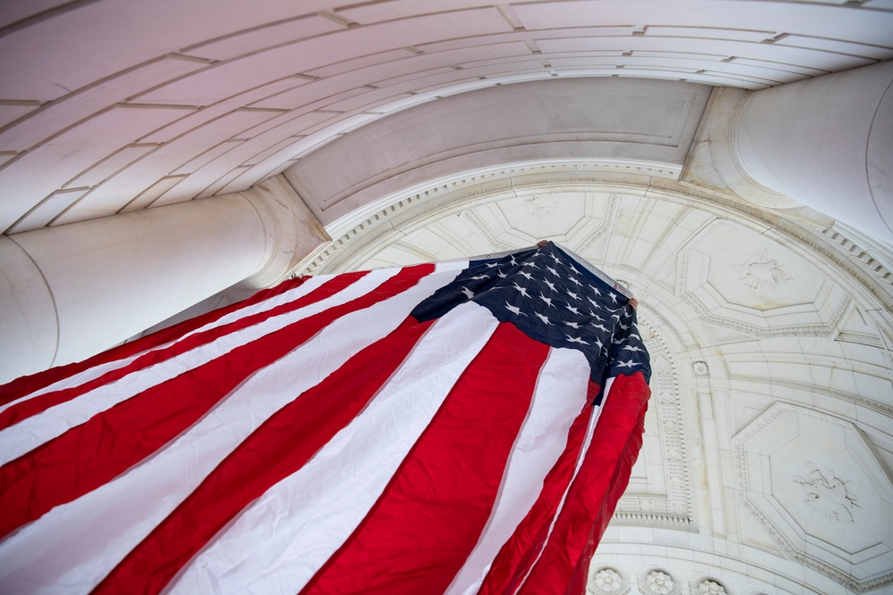 U.S. Flags are Hung in the Memorial Amphitheater in Preparation for the National Memorial Day Observance