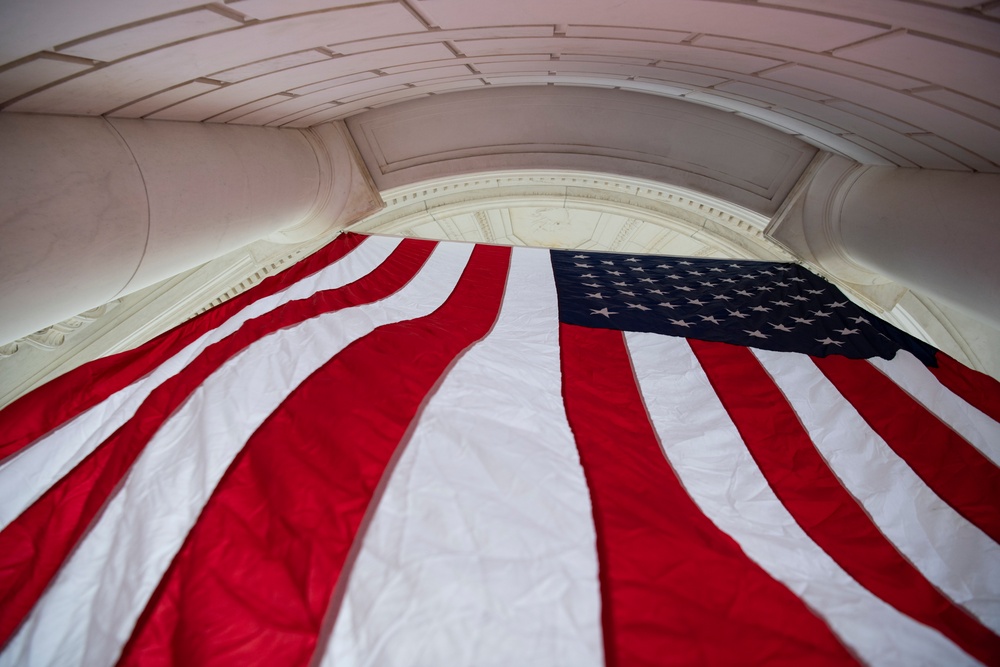 U.S. Flags are Hung in the Memorial Amphitheater in Preparation for the National Memorial Day Observance