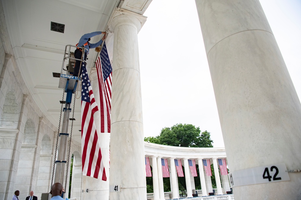 U.S. Flags are Hung in the Memorial Amphitheater in Preparation for the National Memorial Day Observance