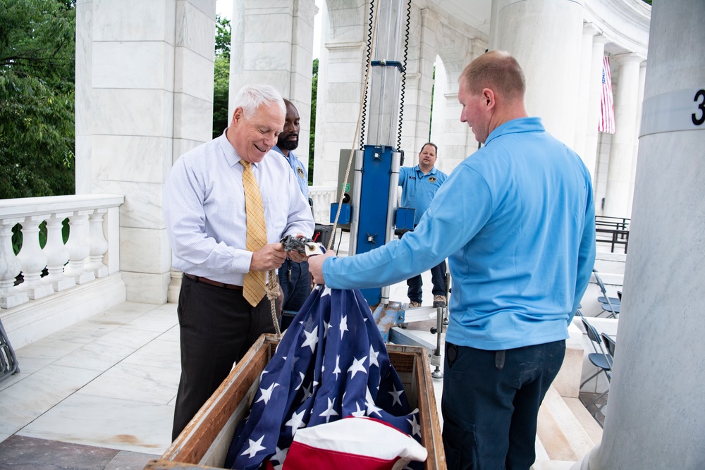 U.S. Flags are Hung in the Memorial Amphitheater in Preparation for the National Memorial Day Observance