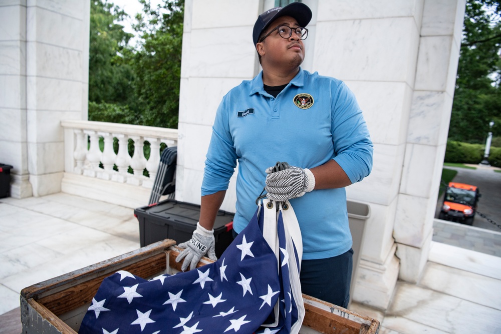 U.S. Flags are Hung in the Memorial Amphitheater in Preparation for the National Memorial Day Observance