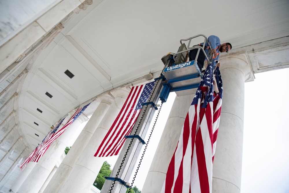 U.S. Flags are Hung in the Memorial Amphitheater in Preparation for the National Memorial Day Observance