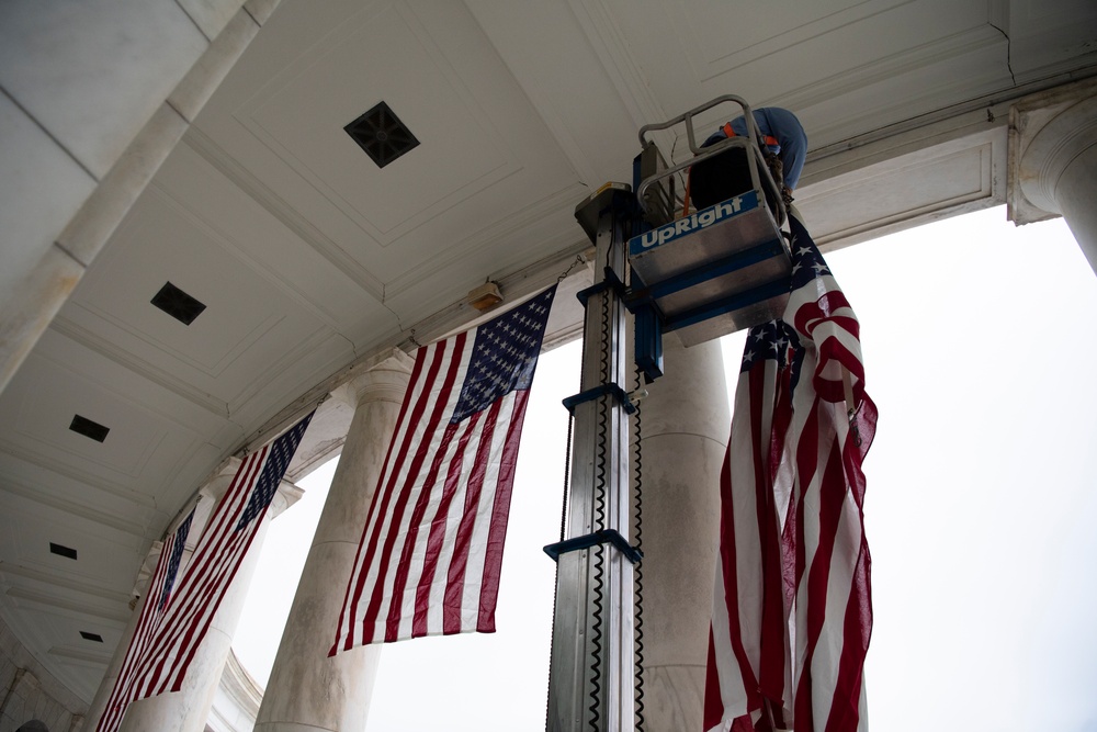 U.S. Flags are Hung in the Memorial Amphitheater in Preparation for the National Memorial Day Observance