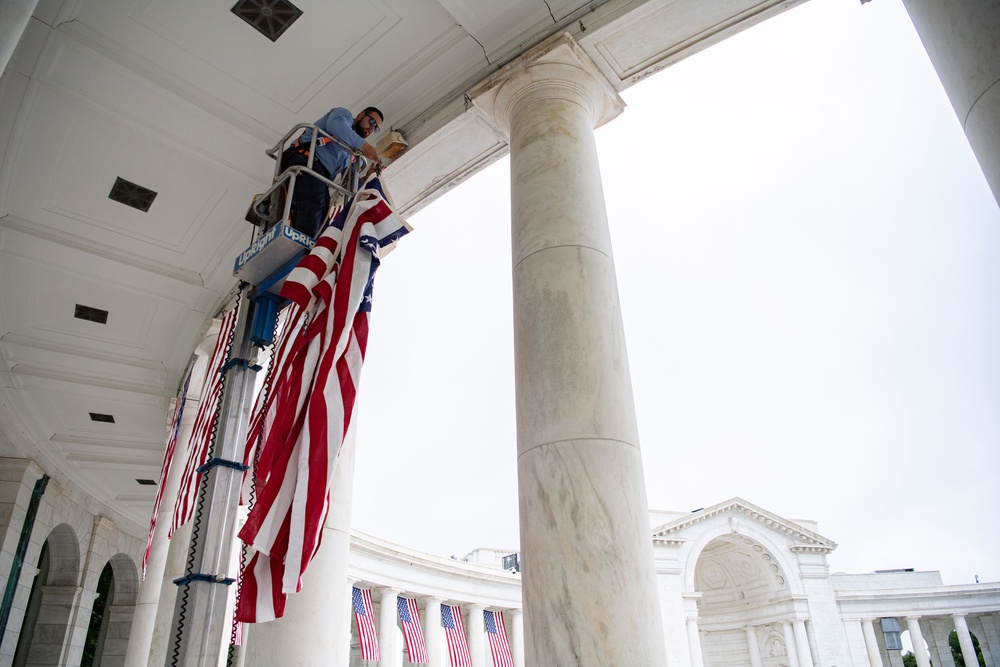 U.S. Flags are Hung in the Memorial Amphitheater in Preparation for the National Memorial Day Observance