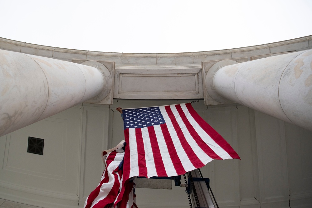 U.S. Flags are Hung in the Memorial Amphitheater in Preparation for the National Memorial Day Observance