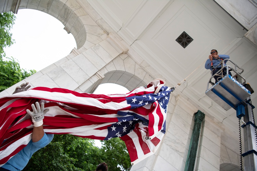 U.S. Flags are Hung in the Memorial Amphitheater in Preparation for the National Memorial Day Observance