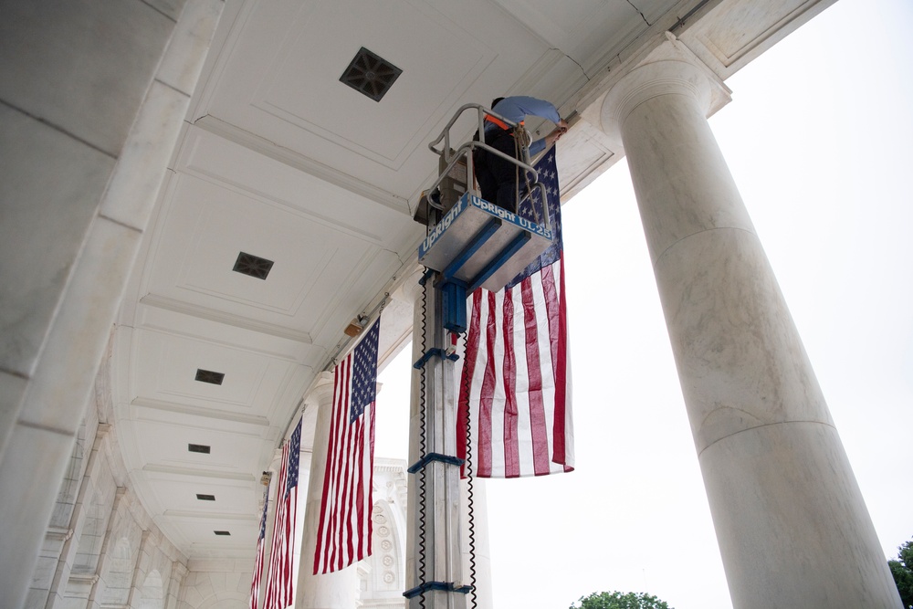 U.S. Flags are Hung in the Memorial Amphitheater in Preparation for the National Memorial Day Observance