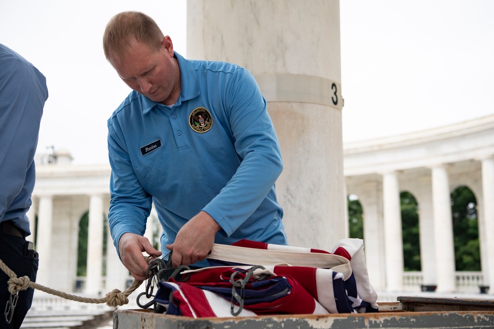 U.S. Flags are Hung in the Memorial Amphitheater in Preparation for the National Memorial Day Observance