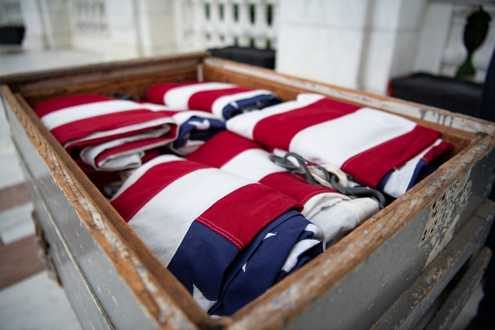 U.S. Flags are Hung in the Memorial Amphitheater in Preparation for the National Memorial Day Observance