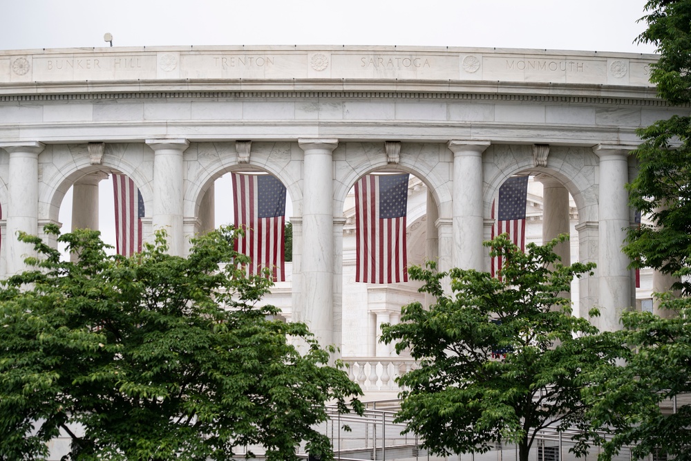 U.S. Flags are Hung in the Memorial Amphitheater in Preparation for the National Memorial Day Observance