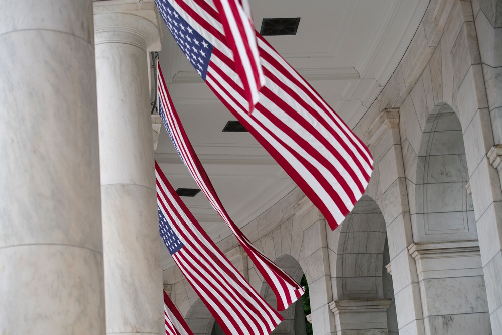 U.S. Flags are Hung in the Memorial Amphitheater in Preparation for the National Memorial Day Observance