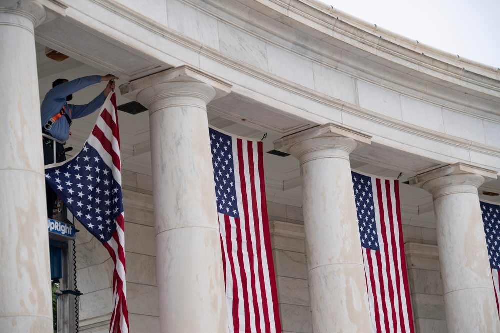 U.S. Flags are Hung in the Memorial Amphitheater in Preparation for the National Memorial Day Observance