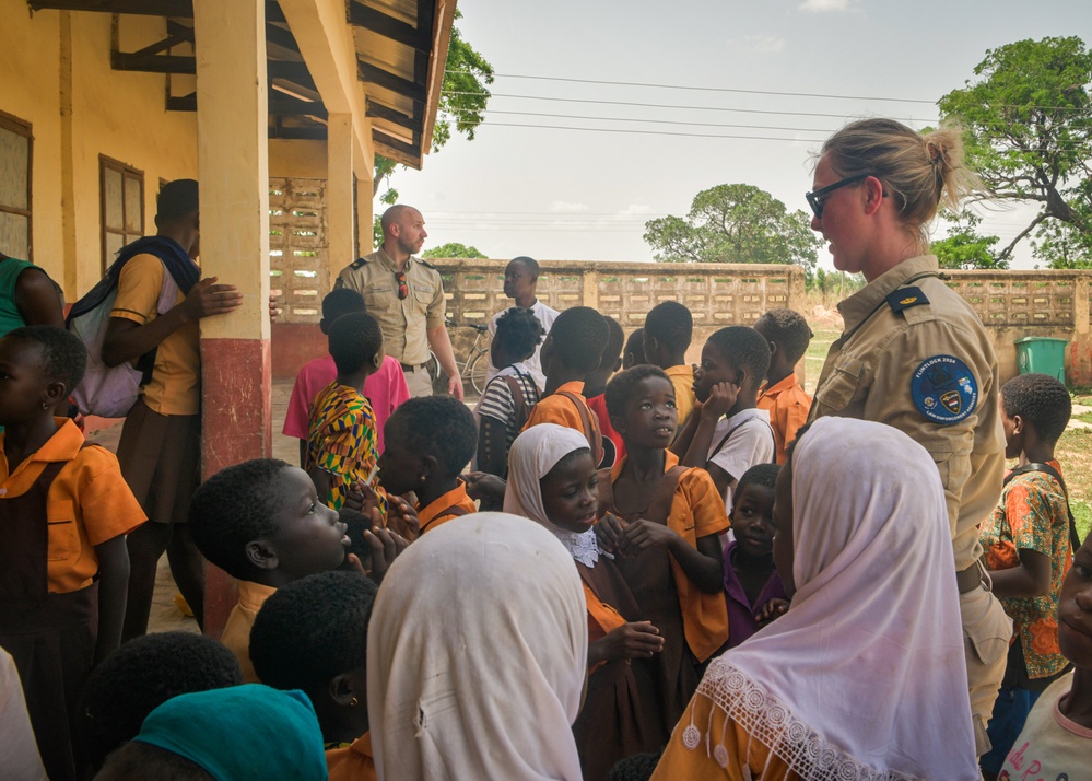 Dutch National Police donate supplies to a local school in Daboya, Ghana during Flintlock 24