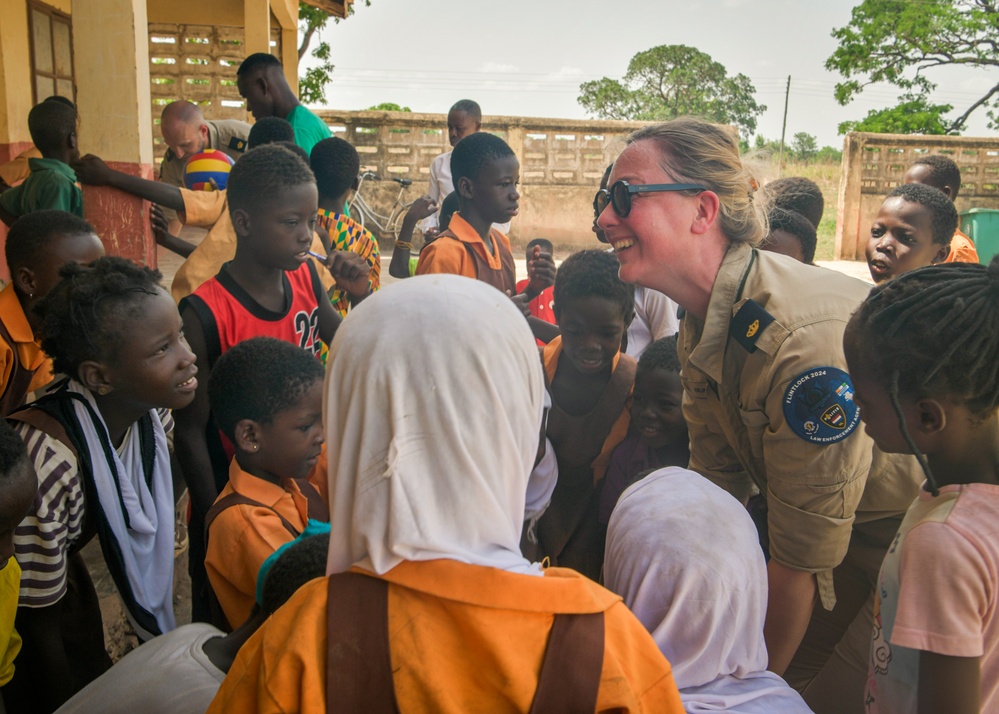 Dutch National Police donate supplies to a local school in Daboya, Ghana during Flintlock 24