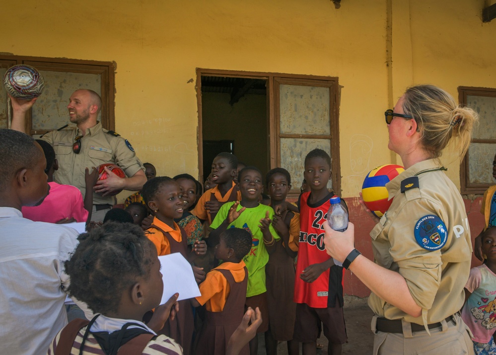 Dutch National Police donate supplies to a local school in Daboya, Ghana during Flintlock 24