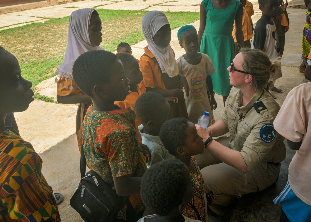 Dutch National Police donate supplies to a local school in Daboya, Ghana during Flintlock 24