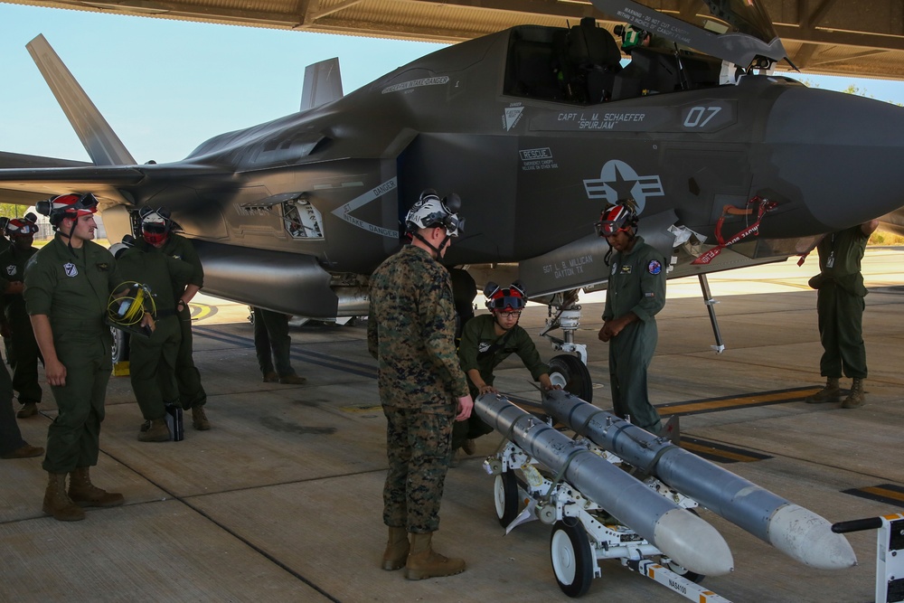 U.S. Marines load CATM-120Cs in Australia