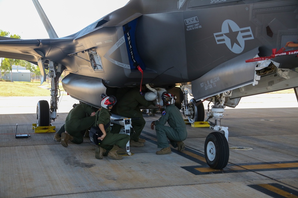 U.S. Marines load CATM-120Cs in Australia