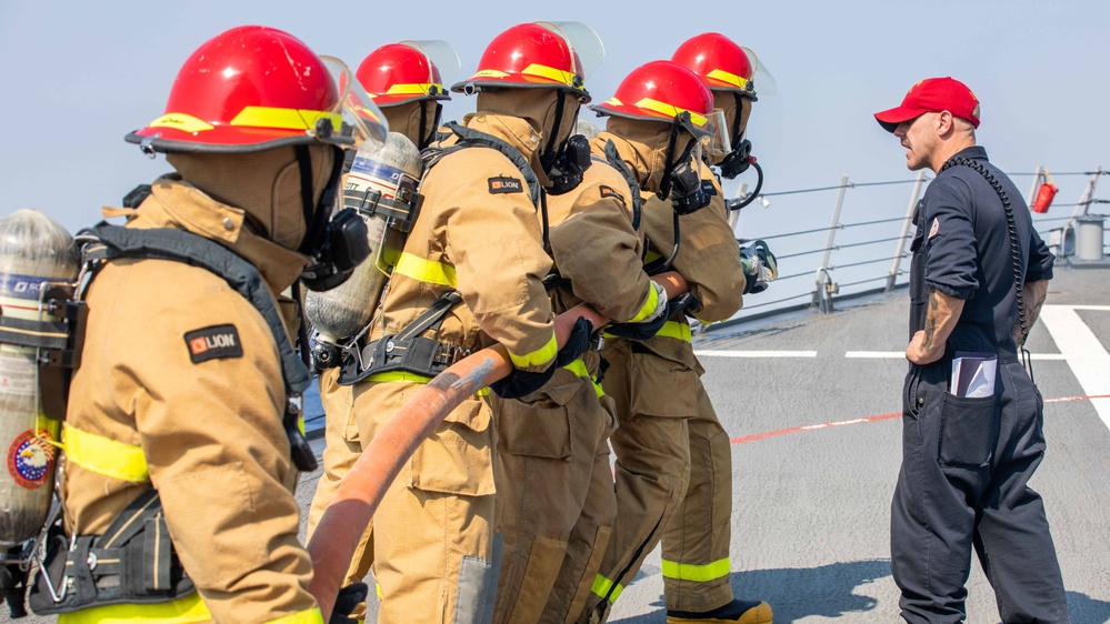 USS Russell (DDG 59) runs a general quarters drill