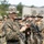 Marines with 3rd Intelligence Battalion throw grenades during a field exercise.