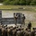 Marines with 3rd Intelligence Battalion throw grenades during a field exercise.
