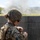 Marines with 3rd Intelligence Battalion throw grenades during a field exercise.