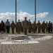 Vice Adm. Thomas Ishee presents coins to members of SETAF-AF