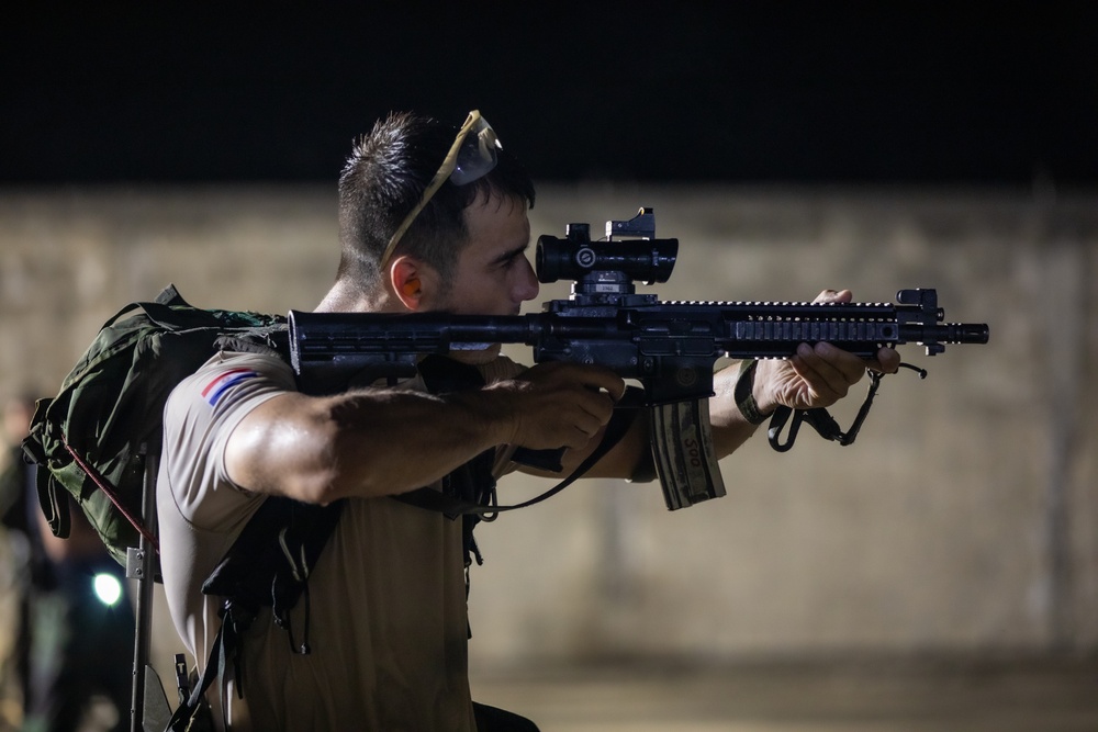 Competitors take part in Fuerzas Comando 2024 Night Ruck March