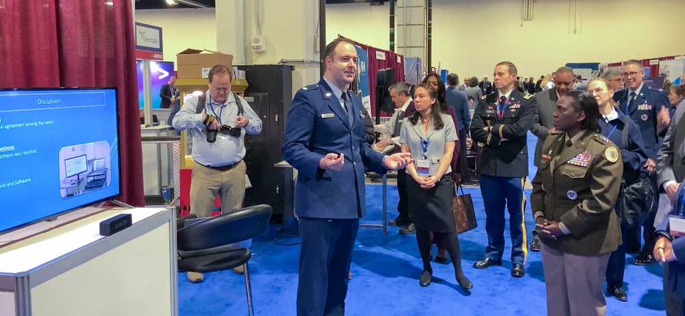 Air Force dentist presents innovative military healthcare research at AMSUS