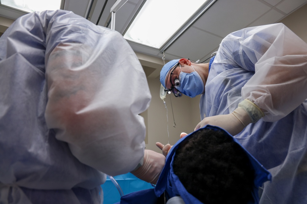 Maj. Vader performs wisdom teeth extraction operation