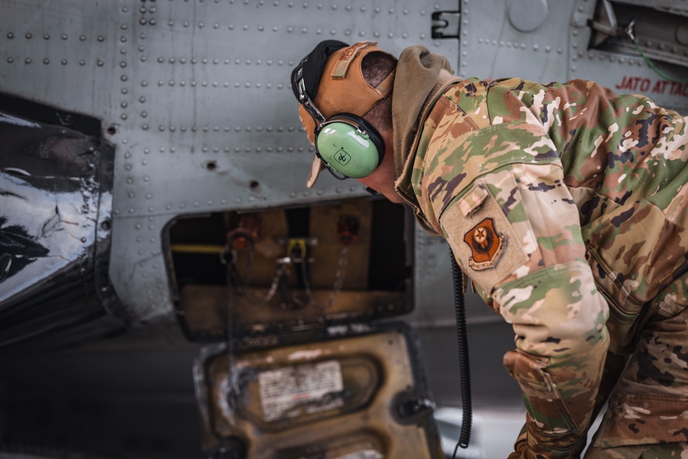 Airman First Class Riley Redman conducts post flight maintenance checks on an LC-130 Skibird at Kangerlussuaq, Greenland May 13th 2024.