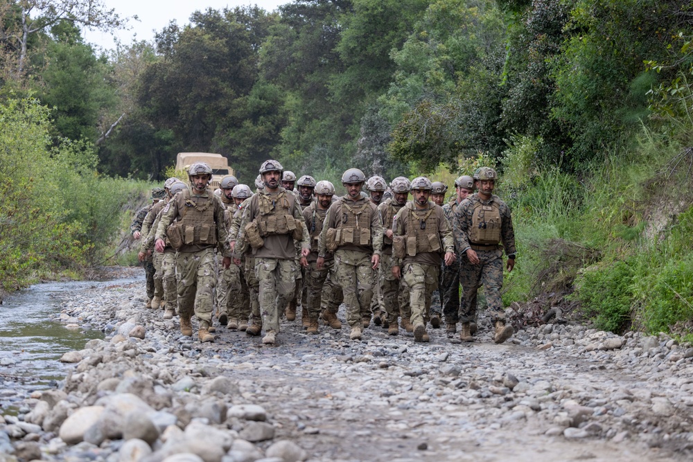 1st MARDIV Marines hike alongside UAE Presidential Guard