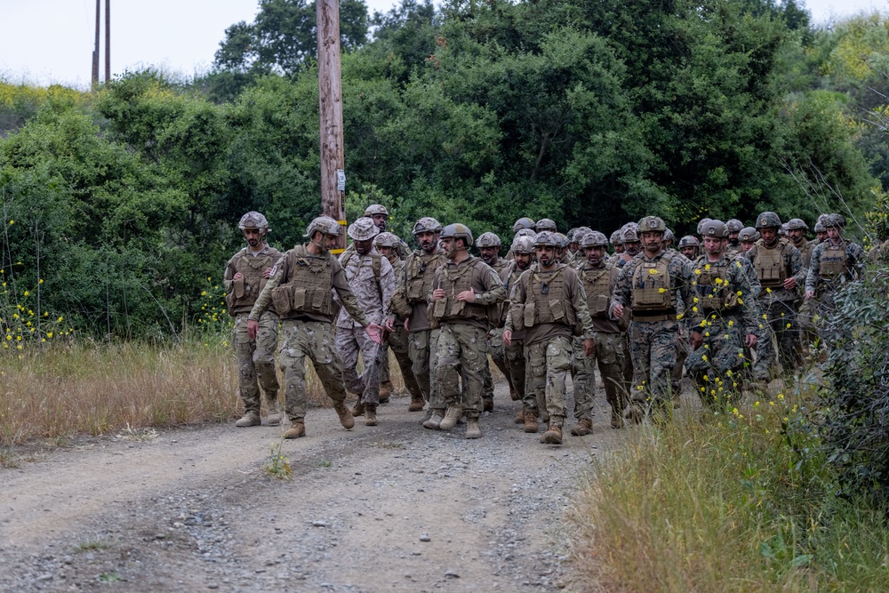 1st MARDIV Marines hike alongside UAE Presidential Guard