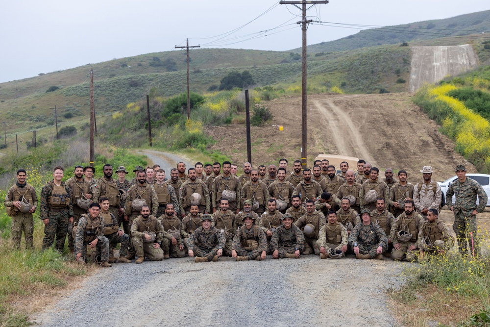 1st MARDIV Marines hike alongside UAE Presidential Guard