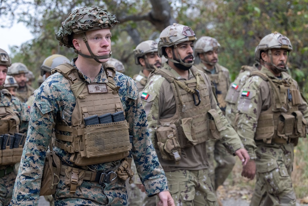 1st MARDIV Marines hike alongside UAE Presidential Guard