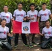 Competitors take part in Fuerzas Comando 24 Aquatic Run-and-Shoot Event