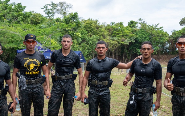 Competitors take part in Fuerzas Comando 24 Aquatic Run-and-Shoot Event