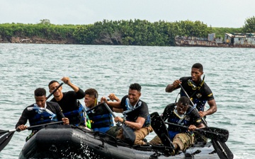 Competitors take part in Fuerzas Comando 24 Aquatic Run-and-Shoot Event
